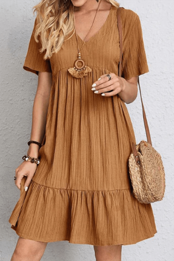 Versatile women's midi dress, easily transitions from day to night. Elegant yet casual everyday style.