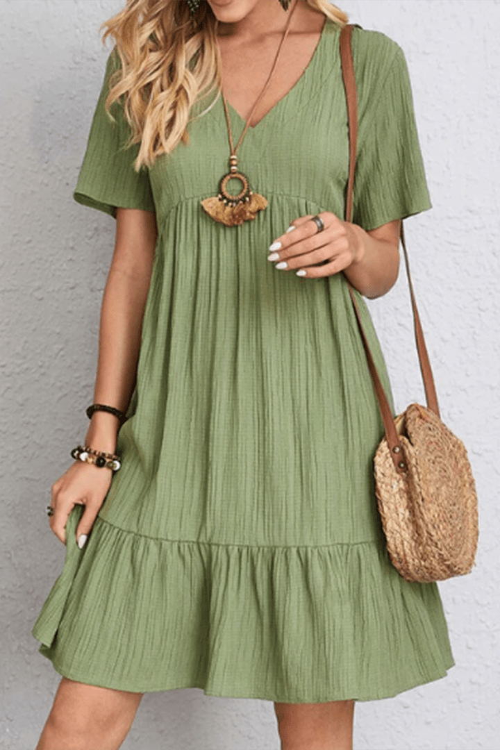 Flattering women's midi dress in a comfortable, relaxed fit. Essential for your everyday minimalist wardrobe.