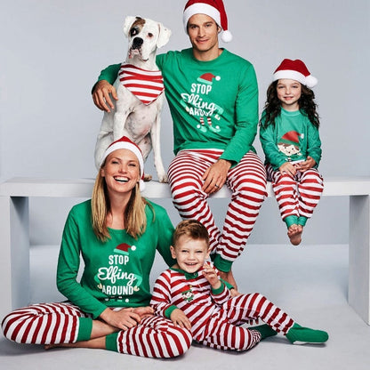 Festive red and white striped family Christmas pajamas, perfect for holiday photos.