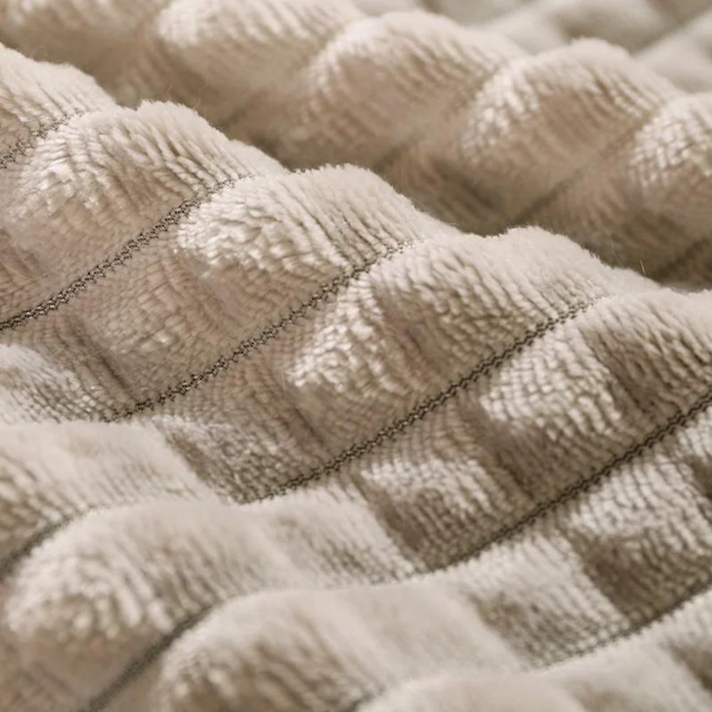 Versatile cozy fleece pet bed for dogs & cats, offering ultimate comfort, warmth, & washable convenience.