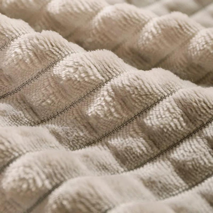 Versatile cozy fleece pet bed for dogs & cats, offering ultimate comfort, warmth, & washable convenience.