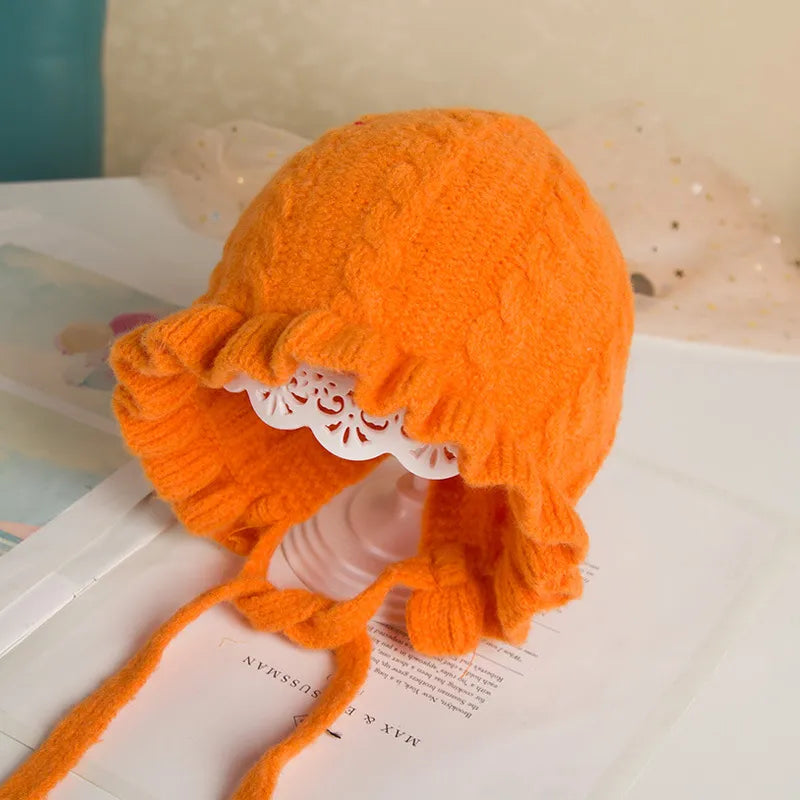 Cute baby girl's hooded winter hat, soft, cozy, and great for chilly weather protection