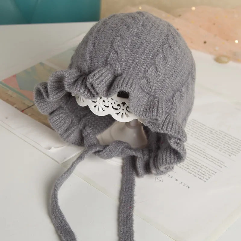 Woolen hooded hat for baby girls, perfect for keeping little ones warm all winter long