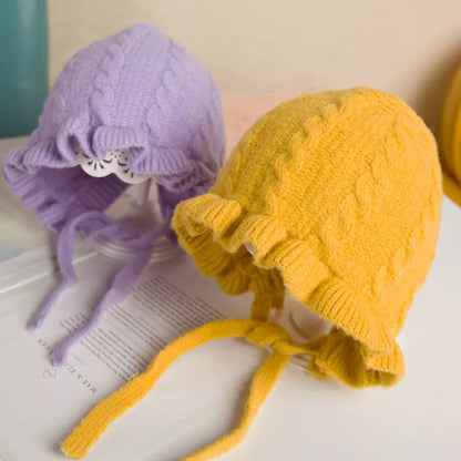 Newborn hooded winter hat for girls, gentle fabric, ensures warmth & comfort outdoors