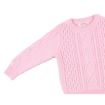 Detailed shot of the cable knit pattern on a warm pullover sweater, essential for baby apparel.