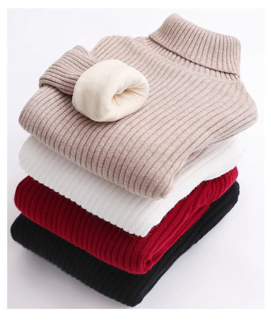 Cozy kids' padded turtleneck sweater in a soft cotton blend, perfect warm winter wear for toddlers.