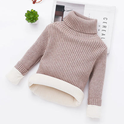 Warm kids' turtleneck sweater showing comfortable padding, a cozy cotton blend for winter wear.