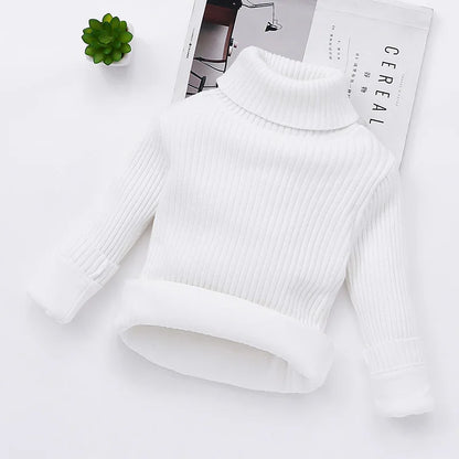 Toddler wearing a padded turtleneck sweater, demonstrating the snug fit and winter comfort.