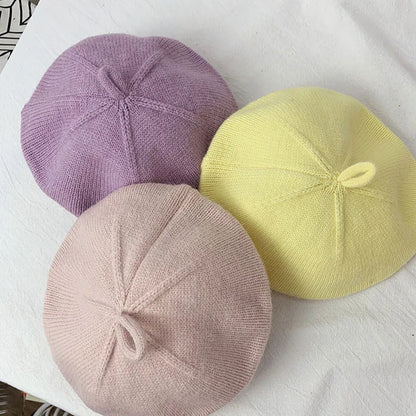 Adorable knitted baby beret, vintage design in a warm fall winter color
