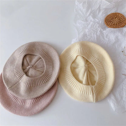 Knitted baby beret with classic vintage appeal, perfect for fall winter