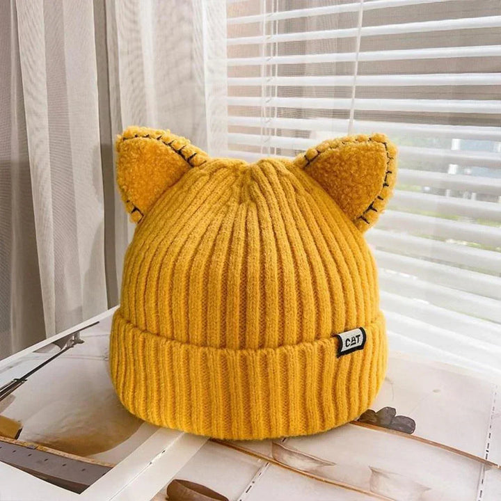 Warm & cozy women's winter hat, knitted with cute cat ears, a must-have cold weather accessory.