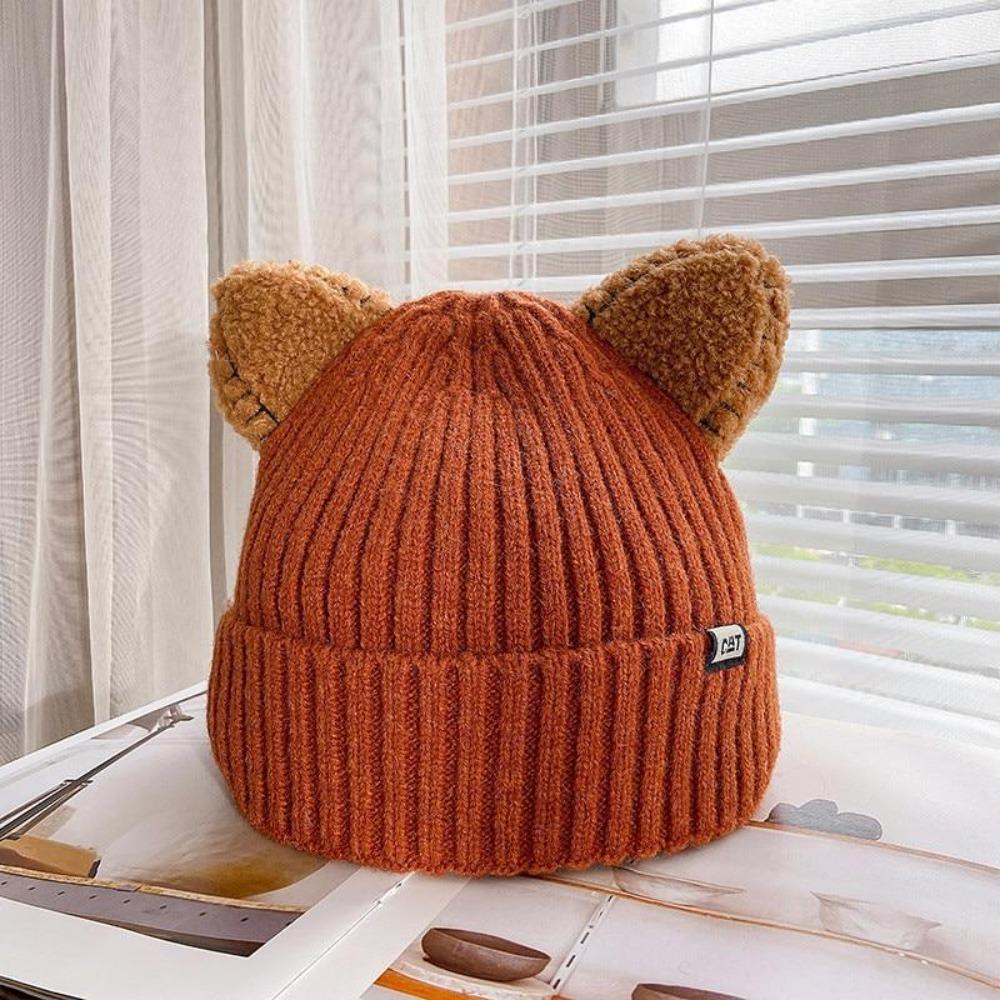 Fashionable women's cat ear knitted hat, designed for ultimate warmth and a cute winter look.