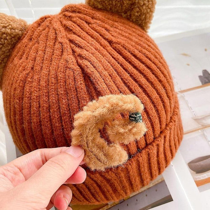 Soft knitted winter hat for women, featuring fun cat ears and a cozy design for cold weather.