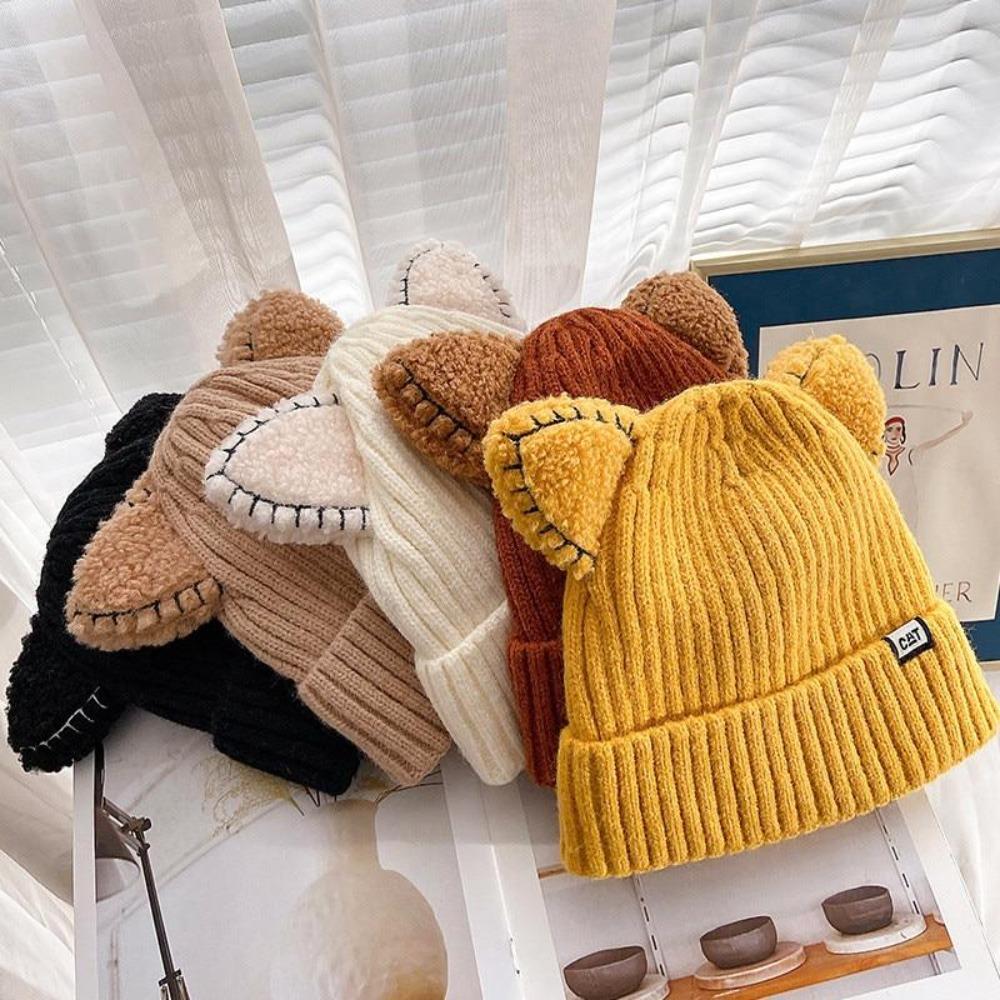 Women's cute cat ears knitted hat, a cozy and stylish accessory to keep warm in winter.