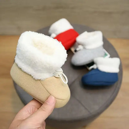 Cozy non-slip baby winter boots in a cute design, perfect for warmth and play.