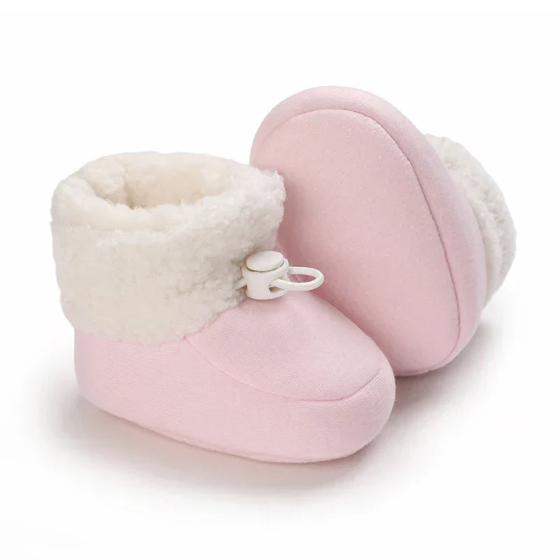 Stylish kids winter footwear, baby boots suitable for snow and cold weather.