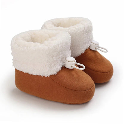 Comfortable winter shoes for toddlers, offering warmth and protection in cold conditions.