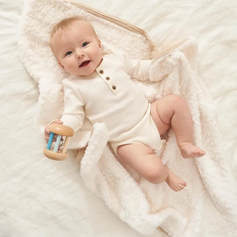 Abstract patchwork cozy swaddle blanket, soft polyester ideal for baby sleep and comfort