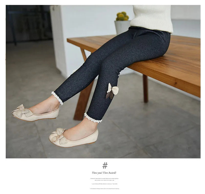 Softest girls' leggings with cute bow accents, perfect for everyday winter & spring comfort