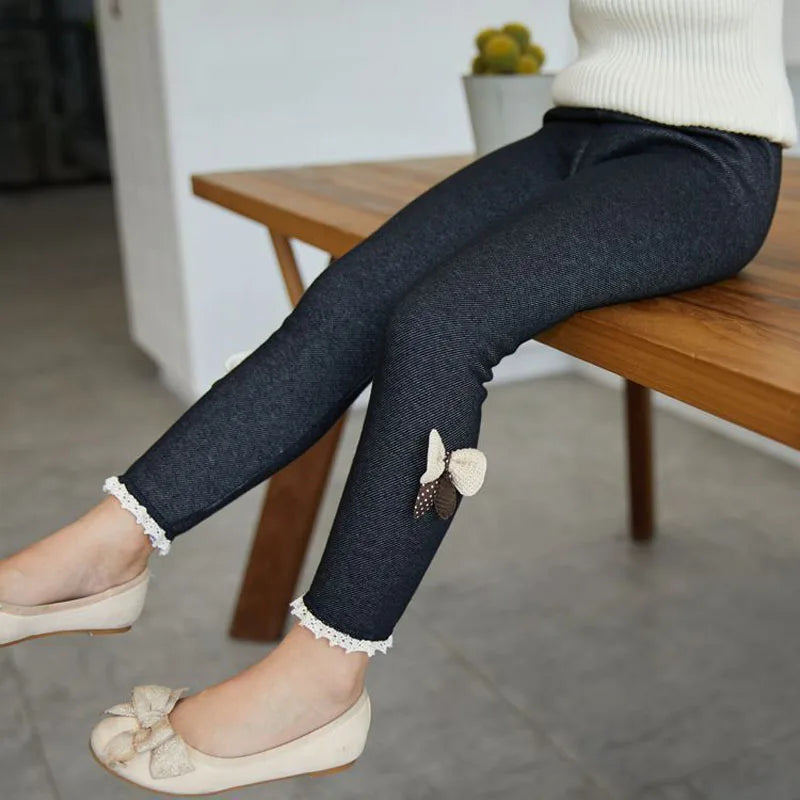 Girls' fashion: soft, durable leggings with adorable bows, perfect for active toddlers