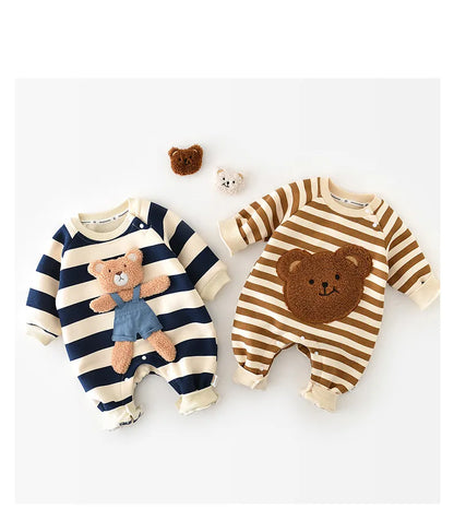 Newborn in a striped bear romper, detail of the bear's ears on the hood