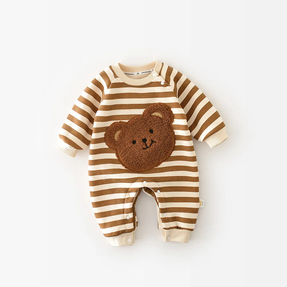 Baby wearing a cozy striped bear romper, full view, suitable for cooler weather
