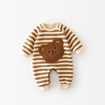 Baby wearing a cozy striped bear romper, full view, suitable for cooler weather