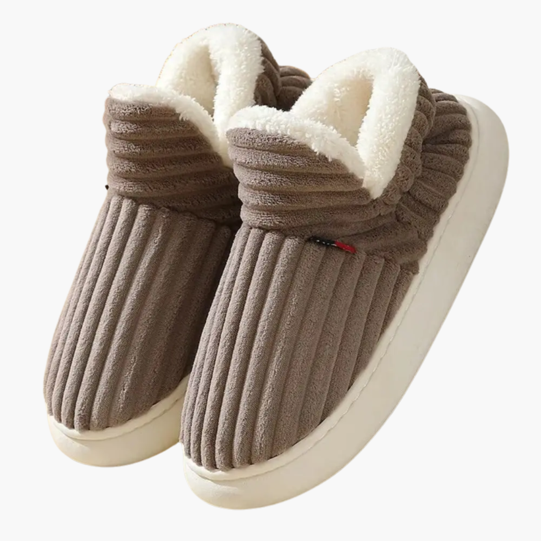 Stylish women's ribbed bootie slippers in soft plush material, offering cozy warmth & ultimate indoor comfort.