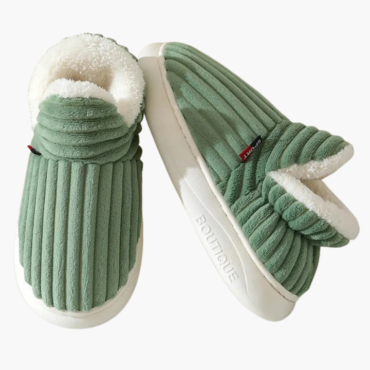 Ultimate indoor comfort with these women's cozy ribbed bootie slippers. Soft, warm, and plush lounge footwear.