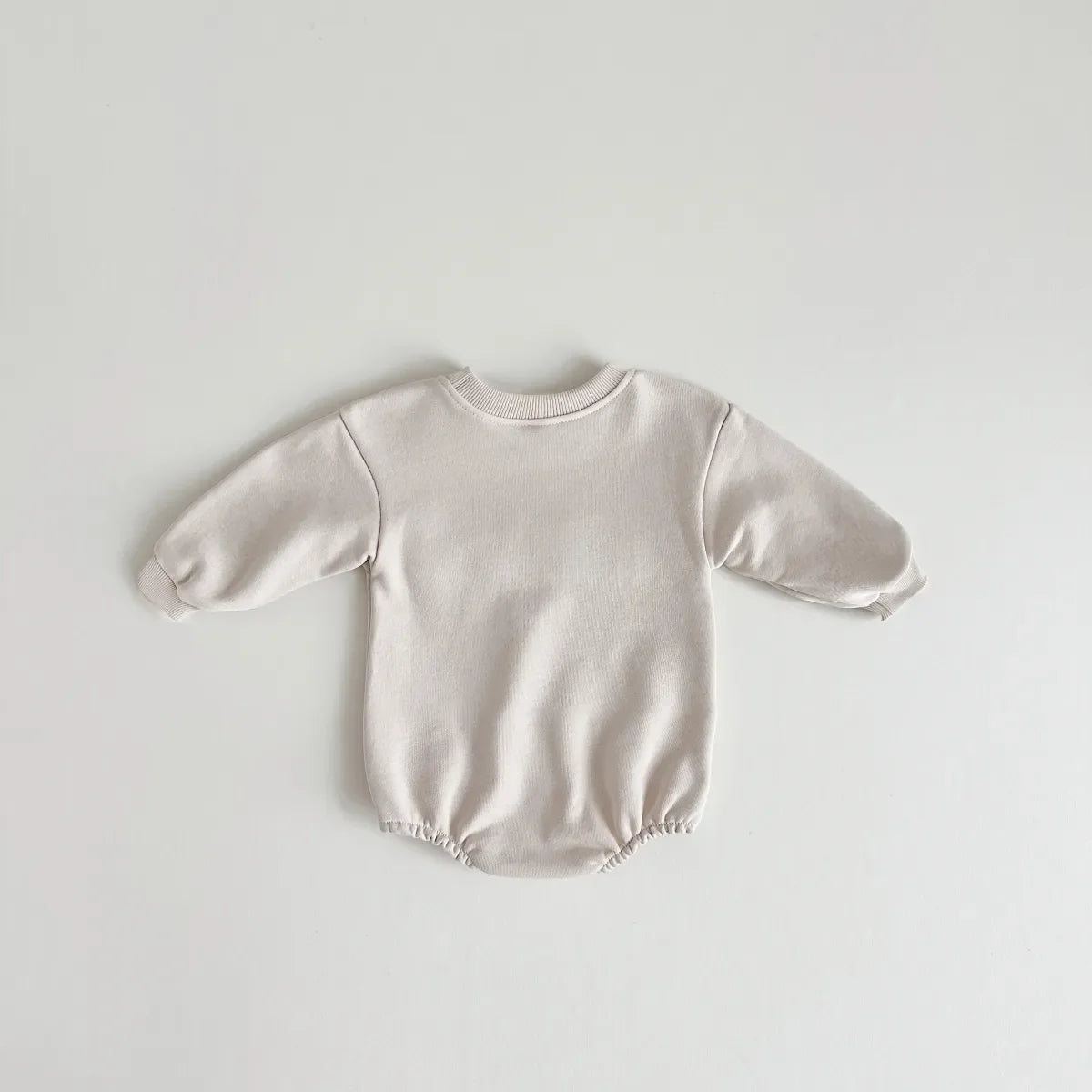 Stylish khaki baby romper, 'love' embroidered, perfect for infant clothing and baby outfits.