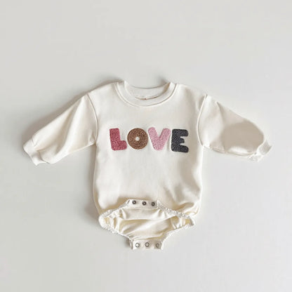 Khaki baby romper with 'love' embroidery, soft cotton blend. Ideal for baby boy and girl outfits.