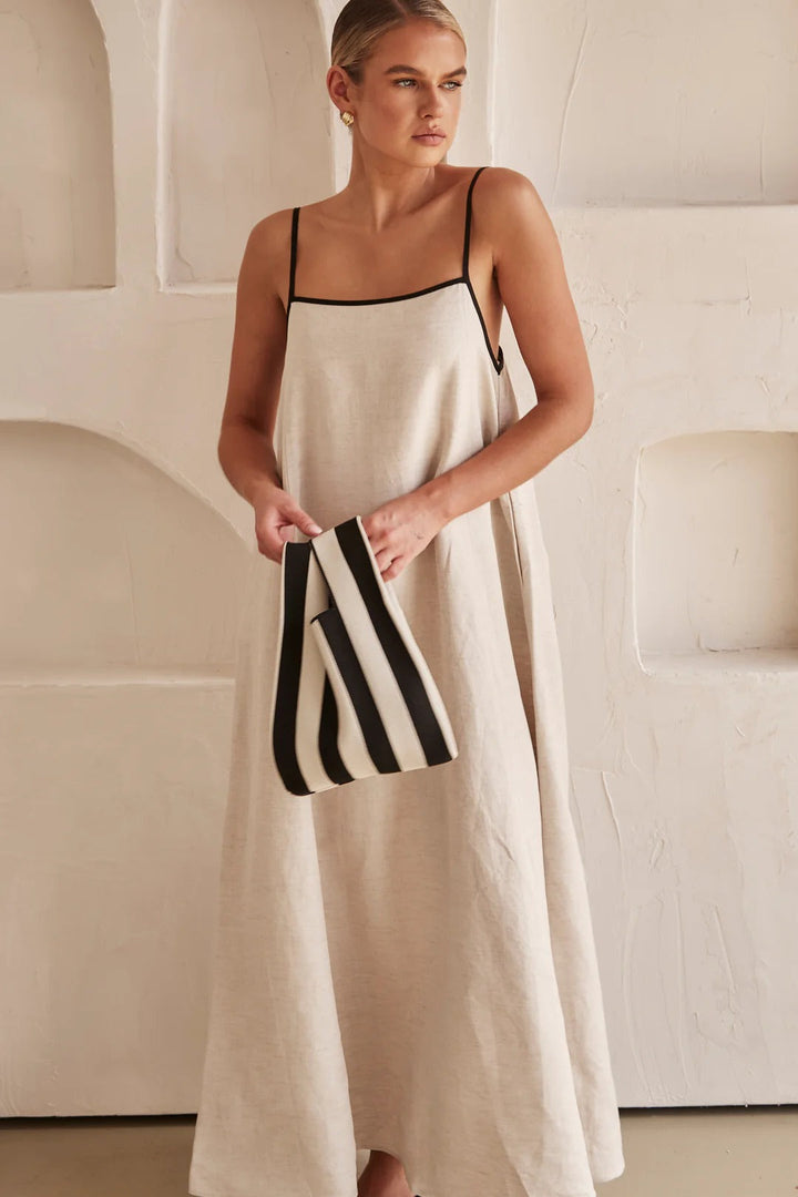 Casual cream oversized maxi dress for women, comfy spaghetti strap & square neck, ideal vacation wear.