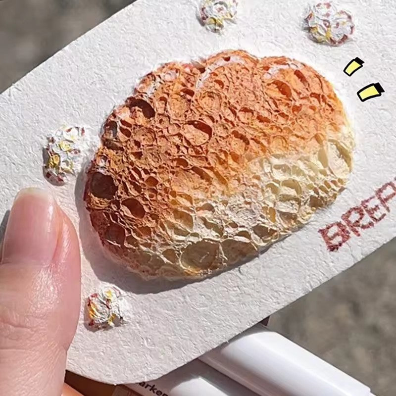 Variety of textured effects achieved on a miniature wall using the Creative Texture Art Pen Set, art markers