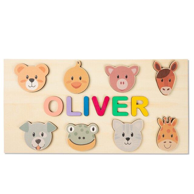 Toddler holding a piece of a custom wooden name puzzle, an interactive learning experience