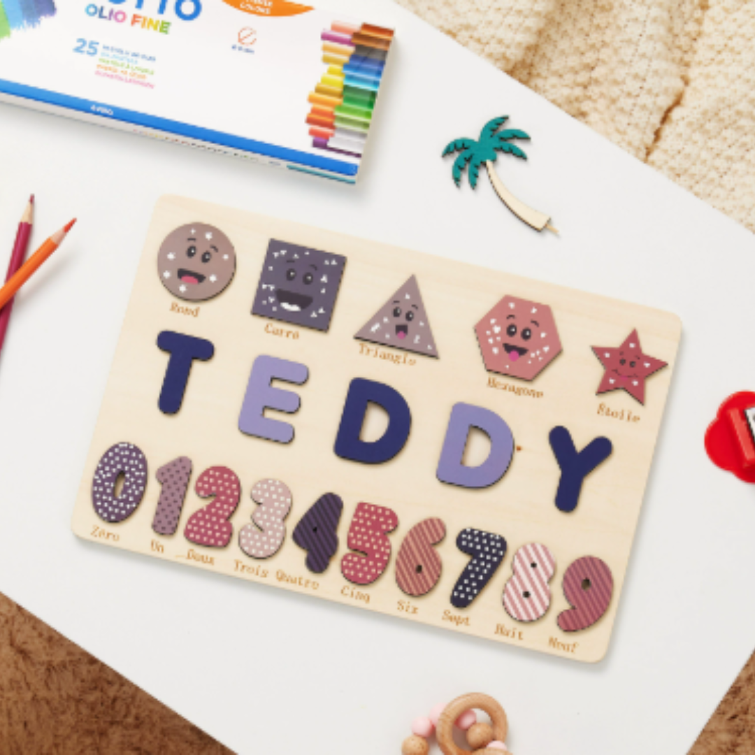 Close-up of a customized wooden name puzzle, highlighting the engraved child's initial