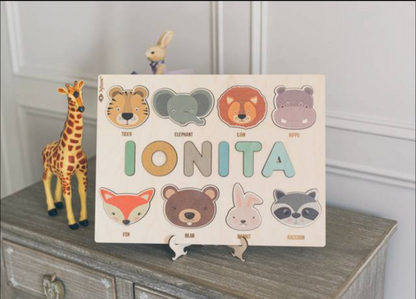 Educational wooden name puzzle assembled, displaying a child's full name, teaching tool