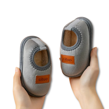 Velvet baby footwear with an anti-slip sole, ensuring stability for little ones learning to walk