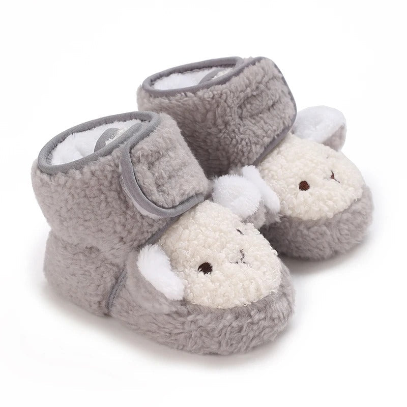 Adorable fox design baby winter shoes, ensuring warm and cozy feet for infants.