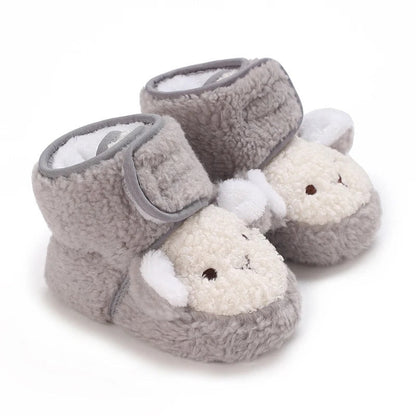 Adorable fox design baby winter shoes, ensuring warm and cozy feet for infants.