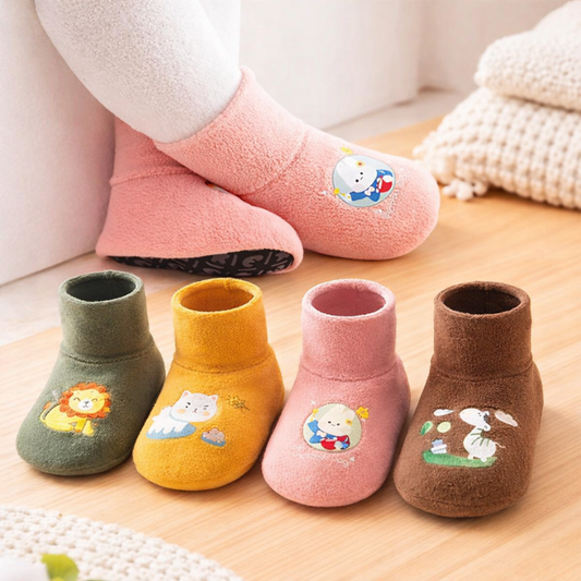 Cute baby anti-slip plush winter socks with cartoon animals, perfect for warm infant footwear.