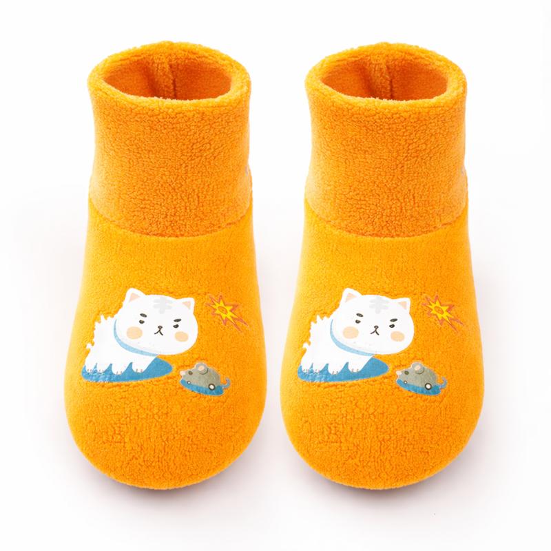 Comfortable baby anti-slip plush socks, providing warmth and safety for toddlers during winter.