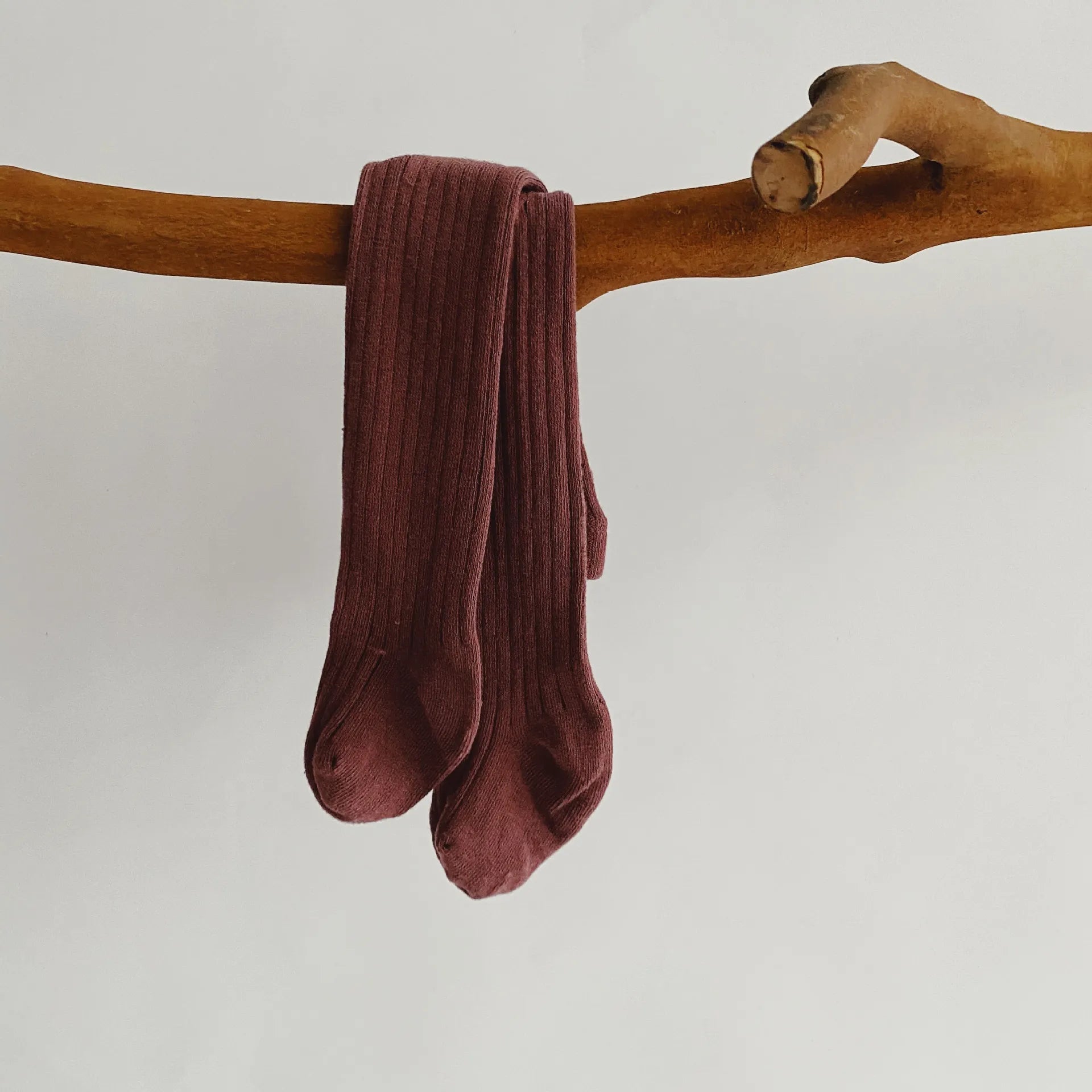 Green cotton knit pantyhose, providing warmth and comfort for active infants and toddlers.