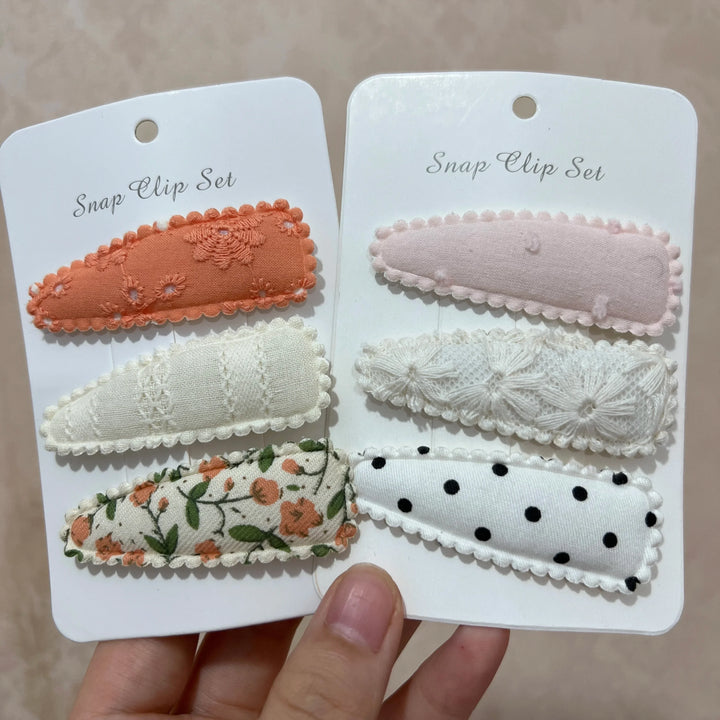 Cute baby girl's flower print hair clips, perfect for infants & toddlers. Sweet & stylish floral accessory set.