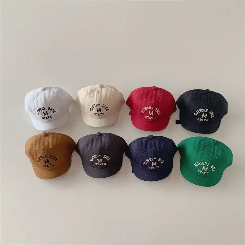 Adorable baby baseball cap featuring embroidered letters, a must-have baby accessory