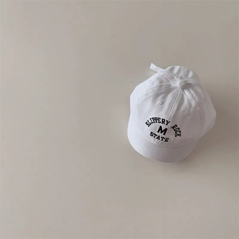 High-quality cotton baby baseball cap with precise letter embroidery, adjustable fit