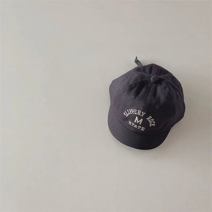 Baby's adjustable baseball cap with clear letter embroidery, perfect for outdoor activities
