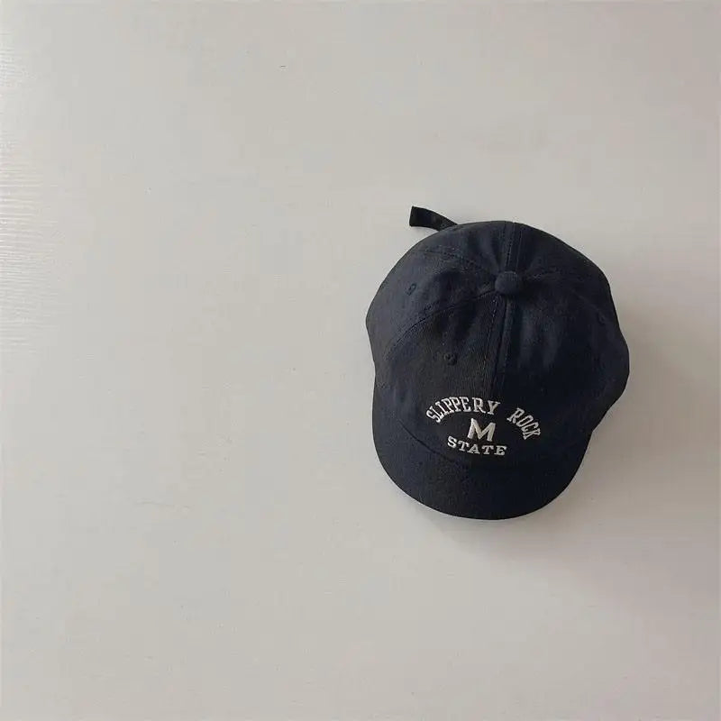 Newborn's first baseball cap with embroidered letters, soft and adjustable cotton fabric