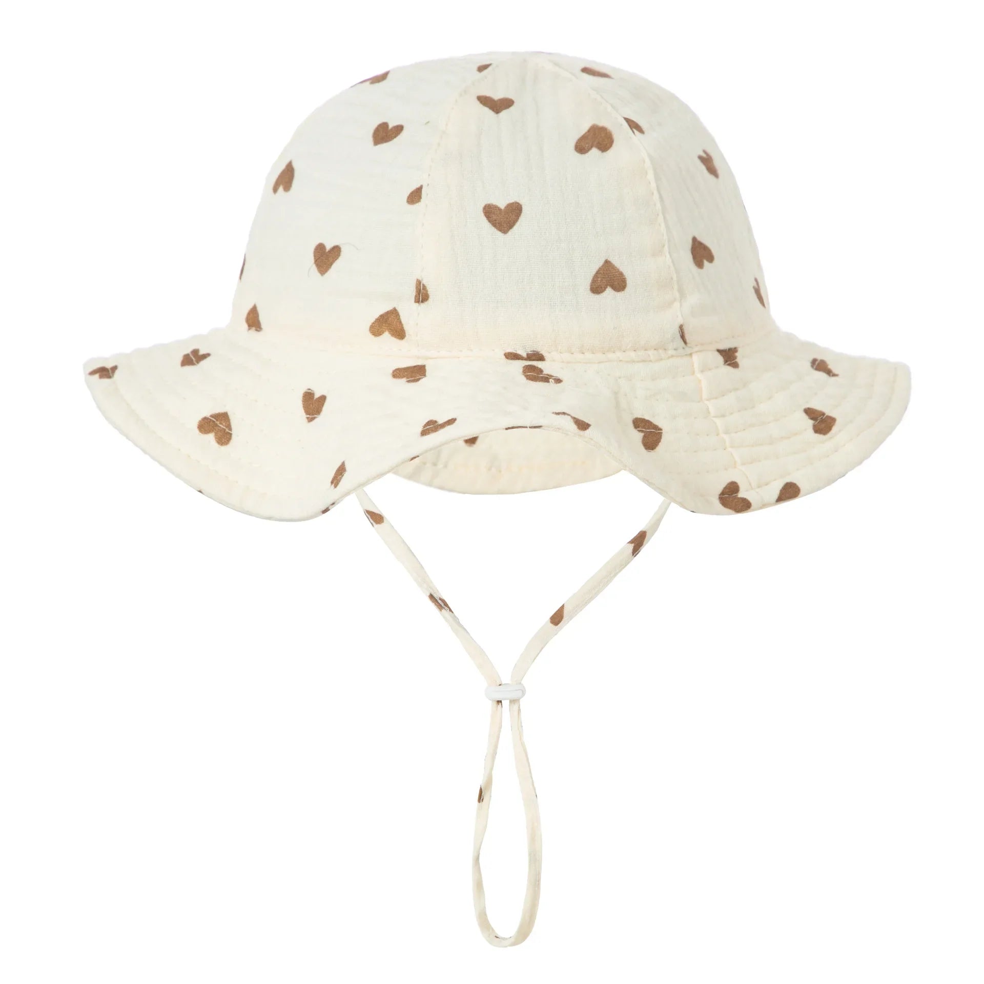 Infant in a soft yellow bucket cap made of cotton, ideal for summer sun protection.
