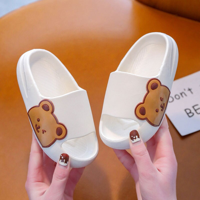 Soft sole anti-slip kids slides with an adorable bear design, ideal for young children's comfort