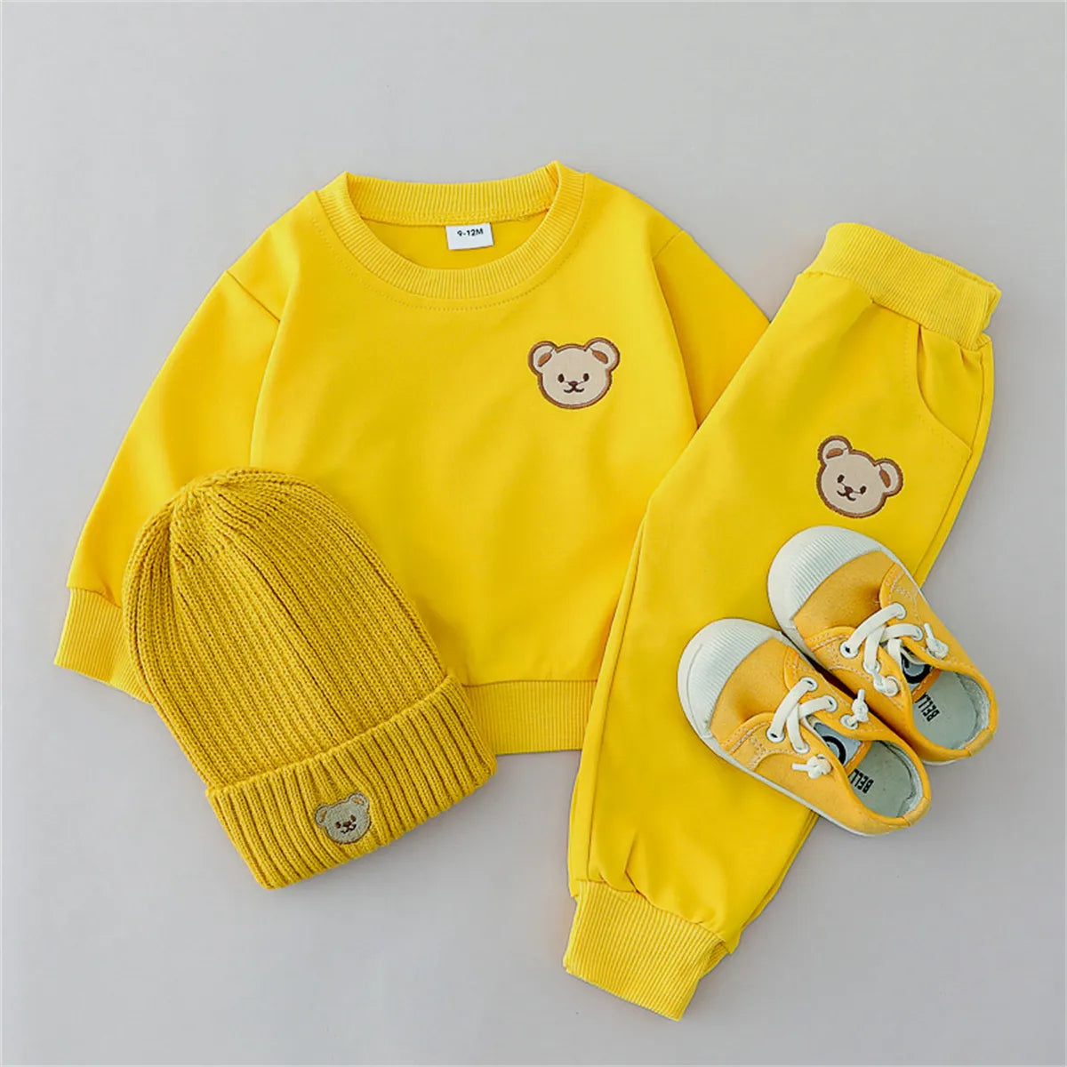 Cute bear print cotton loungewear set for baby, long sleeve top and pants included.